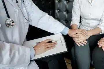 Couple Discussing Problems with Psychiatrist and Relationship Counselor
