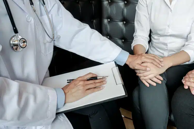Couple Discussing Problems with Psychiatrist and Relationship Counselor