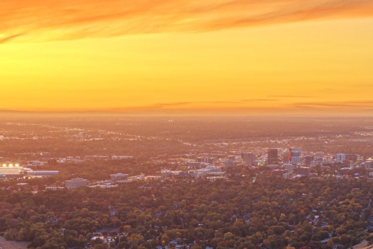 Boise, Idaho, USA view towards downtown from the mountains at dusk.