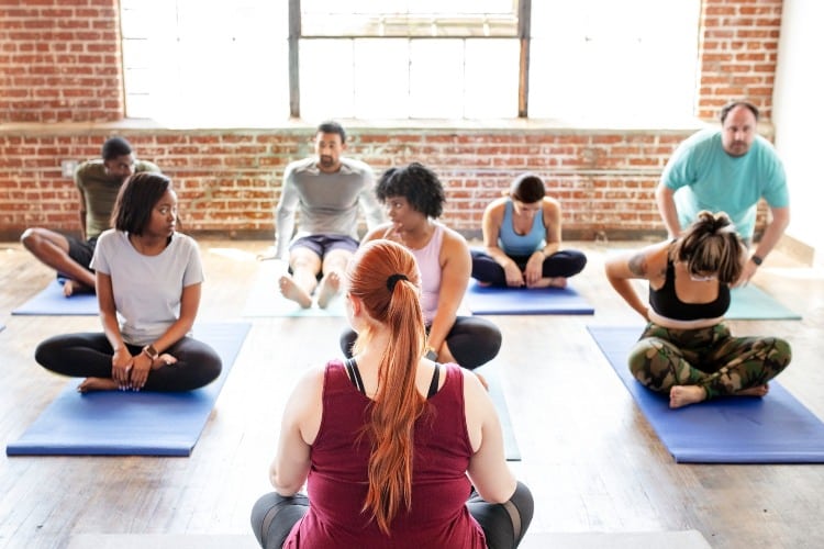 Diverse people in a yoga class