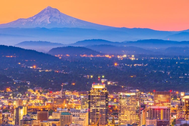 Portland, Oregon, USA downtown skyline with Mt. Hood at dawn.