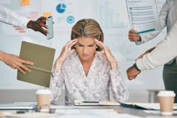 woman who is stressed out at work