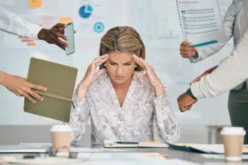 woman who is stressed out at work