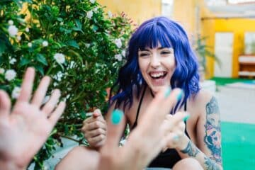 Happy young women in backyard