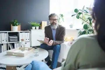 psychologist speaking with patient