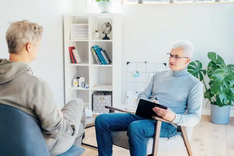 person talking to therapist