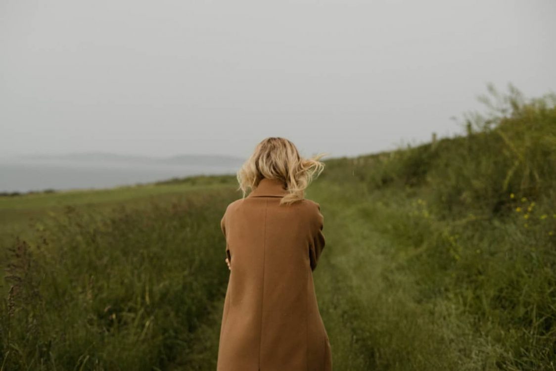 Woman walking through the countryside